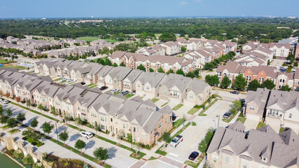 Row of brand new townhomes and apartment complex in downtown Flower Mound, Texas, USA