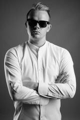 Fototapeta premium Portrait of businessman with Mohawk hairstyle and blond hair