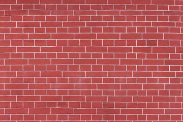 Fototapeta na wymiar Surface of a red brick wall.