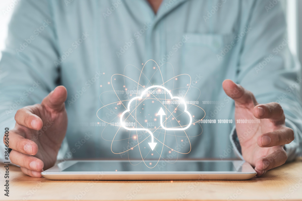 Poster businessman holding virtual cloud computing on tablet to transfer data information and upload downlo