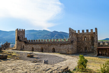 Walls & bastions of Genoese fortress in Sudak, Crimea. Right tower is Nameless, left one is Corrado...