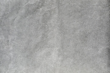 Dark grey grain background paper texture 
