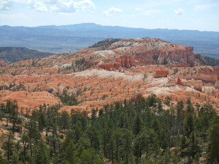 Fototapeta na wymiar Stunning Bryce Canyon, Utah, USA. Spectacular bright orange rock formations, created by natural erosion.
