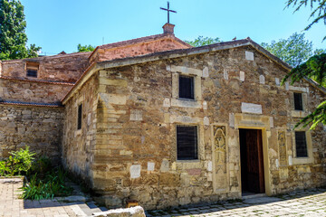 Armenian church Surb Sarkis, Feodosia, Crimea. It was built in XIV AD. Exterior walls decorated by...