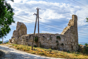 Street view onto Tower of Giovanni di Scaffa, Feodosia, Crimea. Total diameter about 32 m (106 ft)....