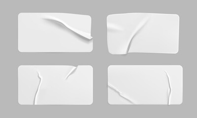 White glued crumpled rectangle stickers mock up set. Blank white adhesive paper or plastic sticker label with wrinkled and creased effect. Template label tags close up. 3d realistic vector