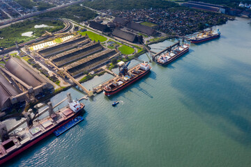 ships loading at the port of Santos in Sao Paulo, Brazil, seen from above, crane