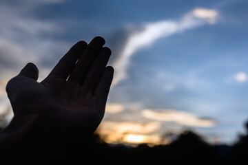 Hands are standing in the sky Ask or plead with God Christian religious concept, the crucifixion of faith and faith in God, prayer request, prayer of faith in the divine power.