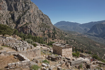 Fototapeta na wymiar Archaelogical site of Delphi, Greece. Delphi is ancient sanctuary that grew rich as seat of oracle that was consulted on important decisions throughout ancient classical world. UNESCO World heritage