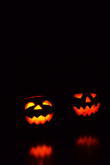 two halloween pumpkins jack o lantern glow in the dark