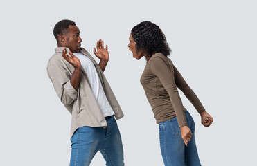 Crazy african american woman yelling at her boyfriend