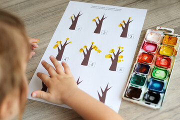 Montessori material. Children's hands. The study of mathematics and seasons. School and kindergarten. early development of children. preparation for school