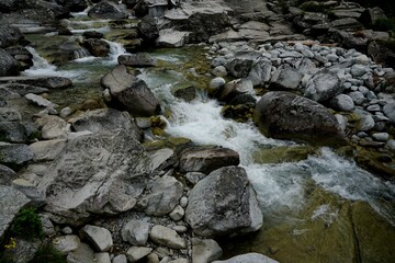 Mountain river and waterfall in High Tatras National Park, Slovakia