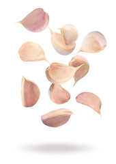 Many garlic cloves falling on white background