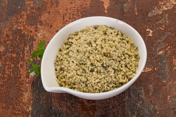 Peeled hemp seeds in the bowl