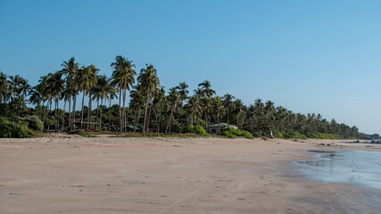 An empty tropical beach north of Chaung Thar, Irrawaddy, Myanmar