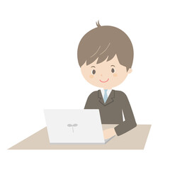 ノートパソコンで仕事をする若い男性