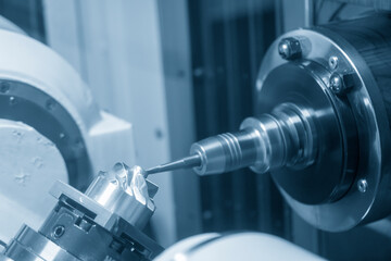 The  5 axis CNC milling machine cutting the turbine blade parts with solid ball end-mill tools. The...