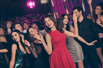 Photo portrait of many young people together dancing in the club