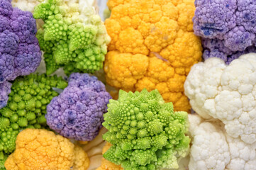 Colorful cauliflowers closeup with copy space