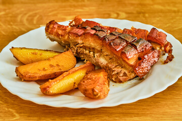 Roasted pork belly with potatoes