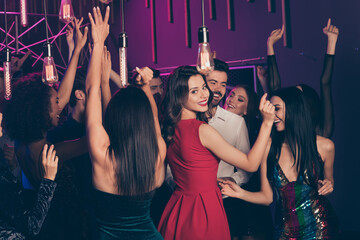Photo of girl wearing red dress lipstick spending time together in night club with neon lights friends company celebrating prom dancing smiling - obrazy, fototapety, plakaty