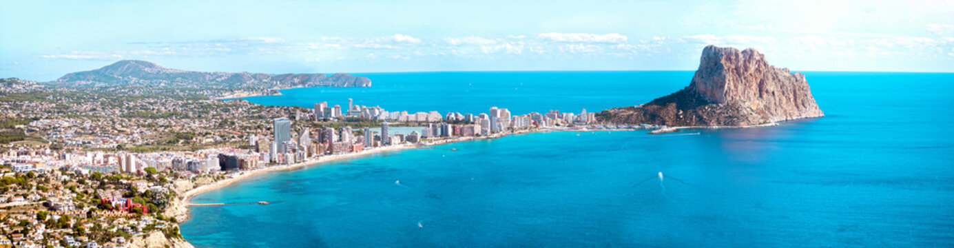Penon de Ifach and Cape Coast panoramic view. Penyal d'Ifac, Penon de Ifachs Natural Park view from Morro de Toix viewpoint. Ifach penon and Calpe or Calp coast in the south of Spain