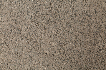 texture gray small stones. Сoarse granular asphalt