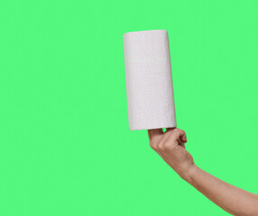 Roll of paper towels isolated on green screen background
