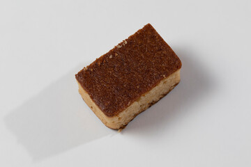 Brown cake isolated on a white background