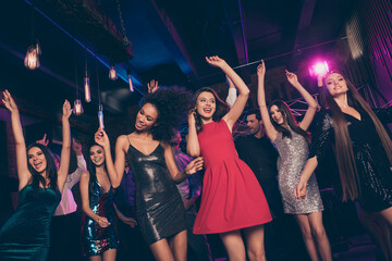 Nice-looking attractive elegant trendy cheerful crowd dancing enjoying corporate event social life...