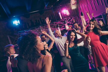 Nice attractive elegant cheerful crowd dancing having fun celebration festal corporate event in...
