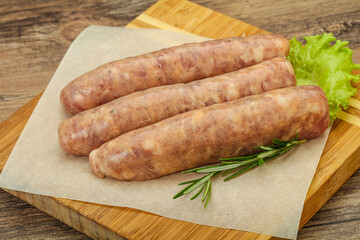 Raw pork meat sausages for grill