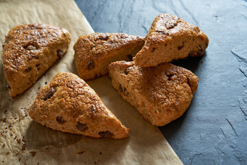 Traditional fresh baked English homemade scones with raisins for breakfast. 