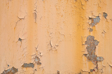 Old rusty orange plaque for the background, rust damages old plaque wall, old rusty orange old plaque and corrosion over a wide area of steel plate surface.