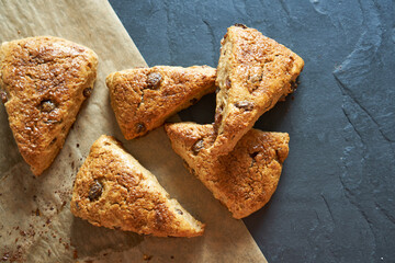 Traditional fresh baked English homemade scones with raisins for breakfast. 