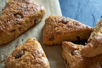 Traditional fresh baked English homemade scones with raisins for breakfast.  