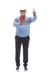 Naklejka premium in full growth. Mature man with a megaphone looking at you