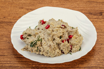 Vagan dietary cusine - mutabal with granet seeds