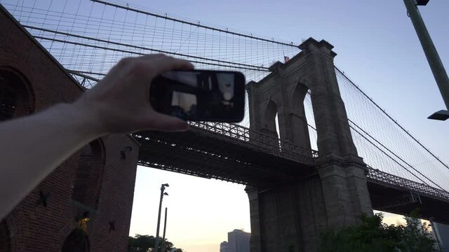 POV on Tourist Photographing Brooklyn Bridge in 4K Slow motion 60fps