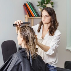 hair cutting process in a beauty salon