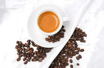 Top view Espresso coffee and coffee beans on a white background