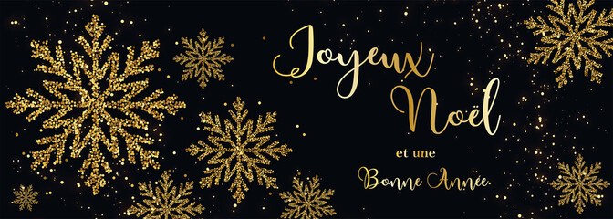 carte ou bandeau sur "joyeux Noël et bonne année"" en or avec des flocons et des paillettes couleur or sur un fond noir