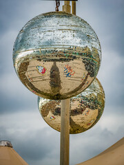 Obraz na płótnie Canvas mirrored beach disco balls