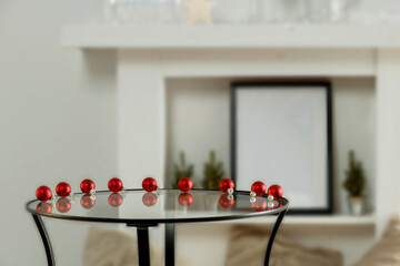 Christmas wooden table with gifts and festive background