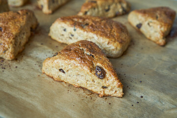 Traditional fresh baked English homemade scones with raisins for breakfast. 