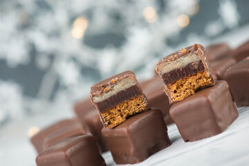 Domino stones, a german traditional christmas sweet with gingerbread, marzipan and jelly covered...