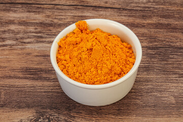 Tumeric powder in the bowl