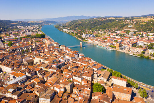 Picturesque view from drone of river Rhone and French city of Vienne in summer, Isere department.