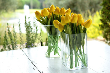 bouquet of yellow tulips in vase